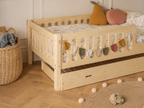Lit enfant en bois ras du sol avec panneaux ajourés 90x190 – Lit Farandole
